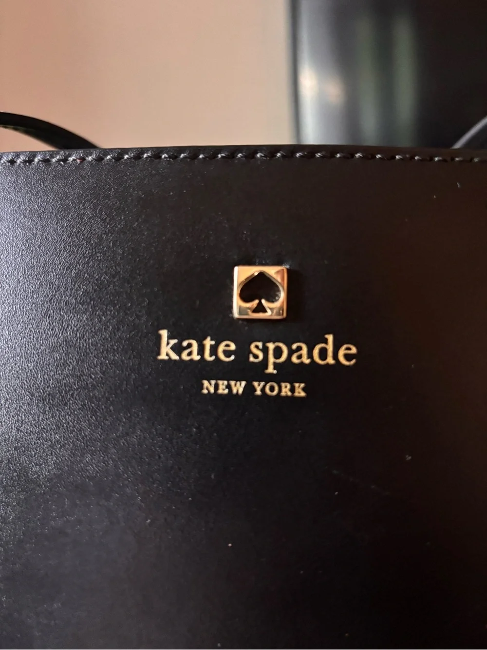 kate spade black leather tote with bow charm